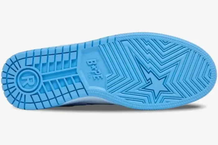 Bottom outsole view of the A Bathing Ape Sk8 Sta M1 Blue sneaker featuring a star pattern. - SKU 1I30191003-BLU