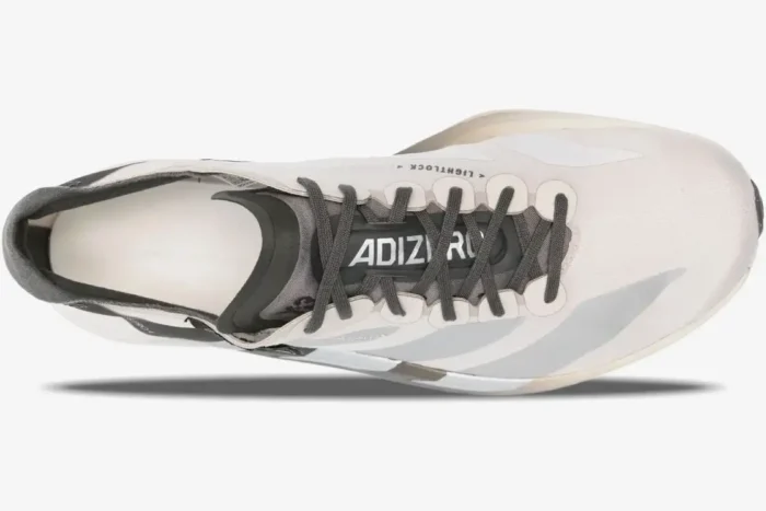 Top-down view of Adidas Adizero Adios Pro 4 x Y-3 running shoes in Alumina Cinder colorway. - SKU JS3154
