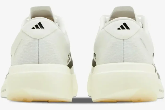 Rear view of white Adidas Adizero Evo SL shoes with black logo and thick cream midsole. - SKU JH6206