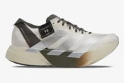 Side profile of Adidas Adizero Adios Pro 4 x Y-3 Alumina Cinder running shoe with silver stripes. - SKU JS3154