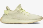 Side profile view of the Adidas Yeezy 350 V2 Butter sneaker in a pale yellow knit. - SKU F36980