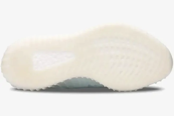 Bottom view of the Adidas Yeezy 350 V2 Mono Ice showing the translucent white outsole and Boost cushioning. - SKU GW2869