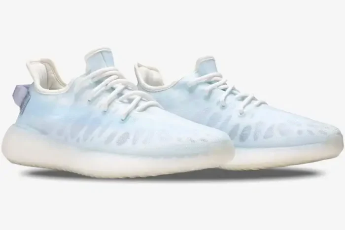 Adidas Yeezy 350 V2 Mono Ice sneakers in light blue, three-quarter side view with white laces. - SKU GW2869