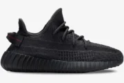 Side profile of the Adidas Yeezy 350 V2 Static Black Non-Reflective sneaker with black Primeknit upper. - SKU FU9006