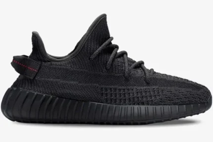Side profile of the Adidas Yeezy 350 V2 Static Black Non-Reflective sneaker with black Primeknit upper. - SKU FU9006