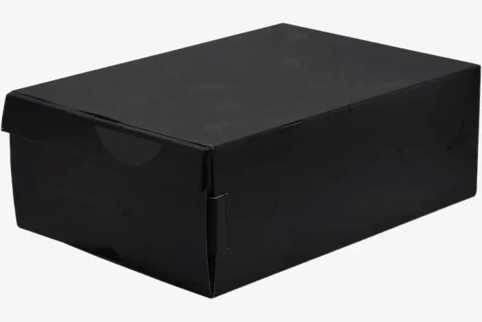 Angled view of the black Air Jordan 1 Low OG x Travis Scott Black Phantom shoebox with tonal logos. - SKU DM7866-001