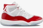 Side view of Air Jordan 11 Retro Cherry sneakers in white and varsity red with patent leather. - SKU CT8012-116