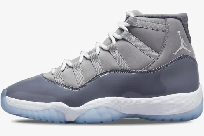 Side profile of the Air Jordan 11 Retro Cool Grey sneaker featuring grey patent leather and a white midsole. - SKU CT8012-005