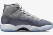 Side profile view of the Air Jordan 11 Retro Cool Grey sneaker with grey patent leather and white midsole. - SKU CT8012-005