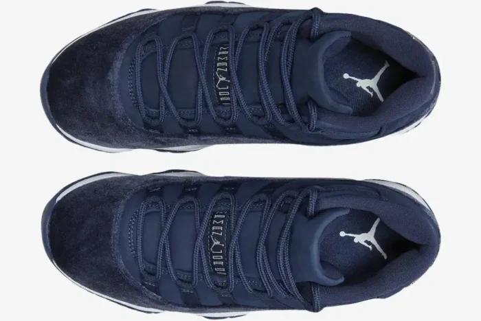 Top-down view of the Air Jordan 11 Retro Midnight Navy velvet women's sneakers with matching navy laces. - SKU AR0715-441