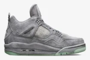 Side profile of the Air Jordan 4 Retro x Kaws in cool grey suede with a translucent green sole. - SKU 930155-003