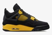 Air Jordan 4 Retro Thunder sneaker in black and tour yellow, side profile view. - SKU DH6927-017