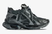 Side profile of Balenciaga Runner Sneaker BL206 in distressed grey and silver with mesh panels. - SKU 677403W3RB11000