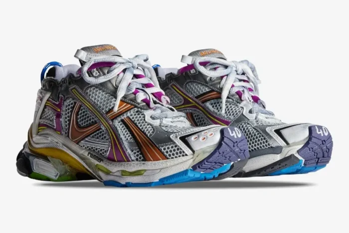 Balenciaga Runner Multicolor Distressed Silver White sneakers shown from a side three-quarter angle. - SKU 772774W3RMU8123