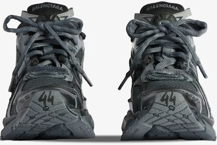 Front view of Balenciaga Runner Sneakers in distressed grey and silver with size 44 on the toe. - SKU 677403W3RB11000