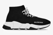 Side profile of a Balenciaga Speed Lace-Up Sneaker in black and white with a thick chunky sole. - SKU 593531W1GV01000