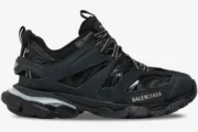 Side profile of a black Balenciaga Track Led sneaker with a chunky multi-layered design and light-up sole. - SKU 555036W2GB11000