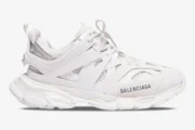 Side profile of Balenciaga Track white multi-layered sneakers with chunky soles and logo detail. - SKU 542023W1GB19000