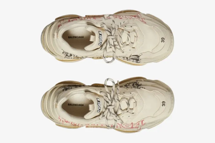 Top-down view of Balenciaga Triple S Graffiti Beige Red sneakers with black and red graphics and size 39 on the toe. - SKU 524039W2FA19010