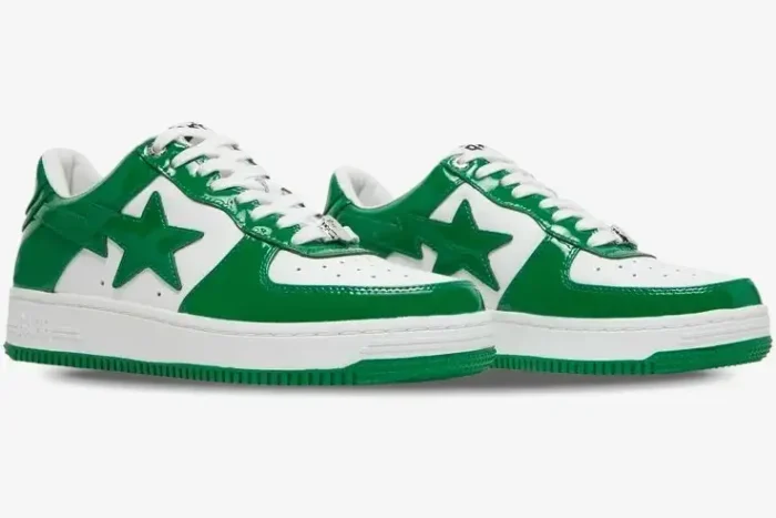 A pair of A Bathing Ape Bape Sta Low sneakers in green patent leather and white, shown from a side-three-quarter angle. - SKU 1H70191001-GRA