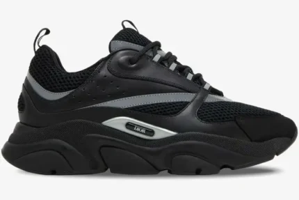 Side view of Dior B22 'Black Silver Reflective' luxury sneakers with black mesh, leather panels, and a chunky sole. - SKU 3SN231ZNG_H969