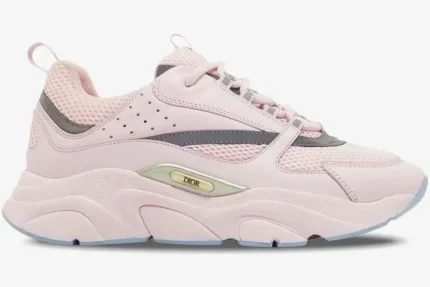 Side profile of a Dior B22 sneaker in pink technical mesh with silver accents and a chunky sole. - SKU 3SN231ZRY_H400