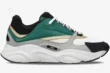 Side profile of Dior B22 sneaker in white, black, green, and gold with a chunky sole. - SKU 3SN231ZTA_H668