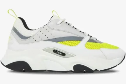 Side profile of Dior B22 'White Yellow' technical mesh and leather sneaker with a chunky white sole. - SKU 3SN231YKA_H061