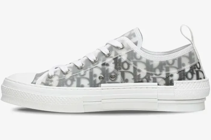 Side profile of Dior B23 Low Top sneakers in white and grey Oblique canvas with transparent overlays. - SKU 3SN249YJP_H069