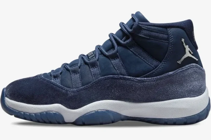 Women's Air Jordan 11 Retro Midnight Navy Velvet sneakers shown from a side profile view. - SKU AR0715-441