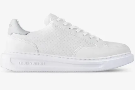 Side profile of a white Louis Vuitton Beverly Hills leather sneaker with a small monogram pattern. - SKU 1AHQY3