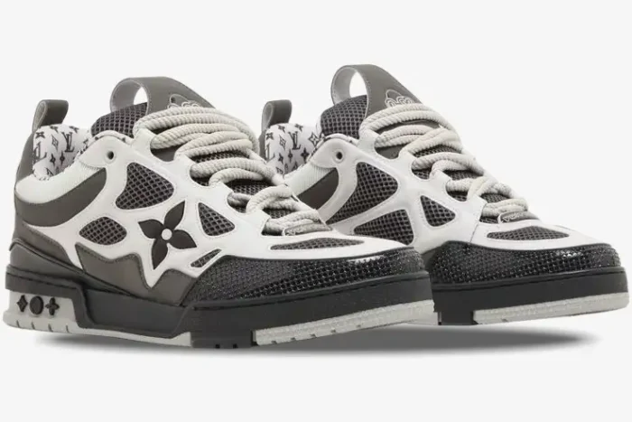 Louis Vuitton LV Skate Sneaker in grey, white, and black, shown from a three-quarter angle. - SKU 1AC52K