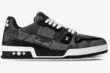 Side profile of a Louis Vuitton LV Trainer in black and white plaid Damier 3D pattern with white laces. - SKU 1A9ZAY