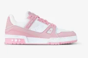 Side profile of a Louis Vuitton LV Trainer Rose Pink women's sneaker with white leather accents. - SKU 1AAW59