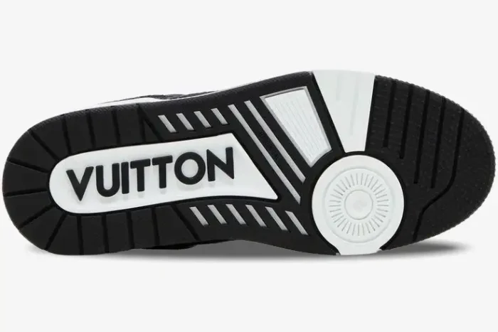 Bottom view of the black and white Louis Vuitton LV Trainer outsole featuring Vuitton branding. - SKU 1A9JG9