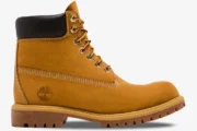 Side profile of a Louis Vuitton x Timberland 6-inch ankle boot in monogram tan nubuck leather. - SKU 1AD72X