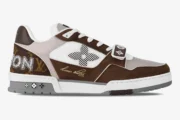 Louis Vuitton Trainer sneaker in brown monogram and white mesh, side profile view. - SKU 1AB8YF