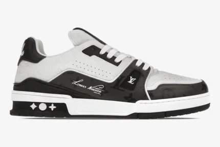 Louis Vuitton Trainer Sneaker Low #54 in black and white, side profile view on a white background. - SKU 1A9AD4