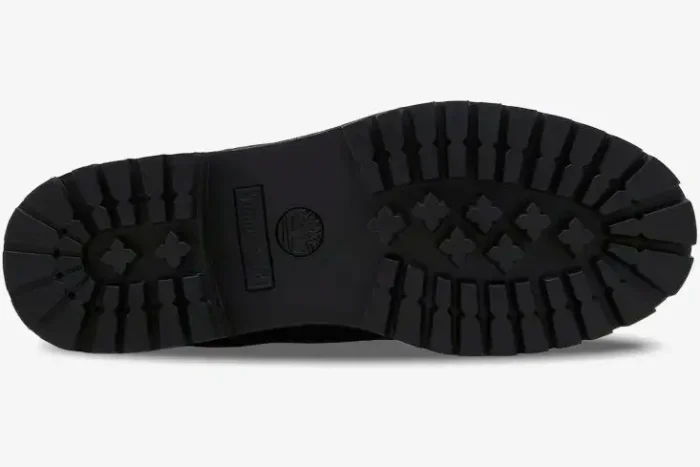 Bottom view of the black Louis Vuitton x Timberland 6-Inch Ankle Boot showing the lugged rubber outsole. - SKU 1AD73H