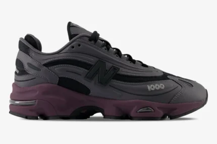Side view of New Balance 1000 sneakers in Magnet Titular Grey and Deep Plum with a chunky midsole. - SKU M1000EB