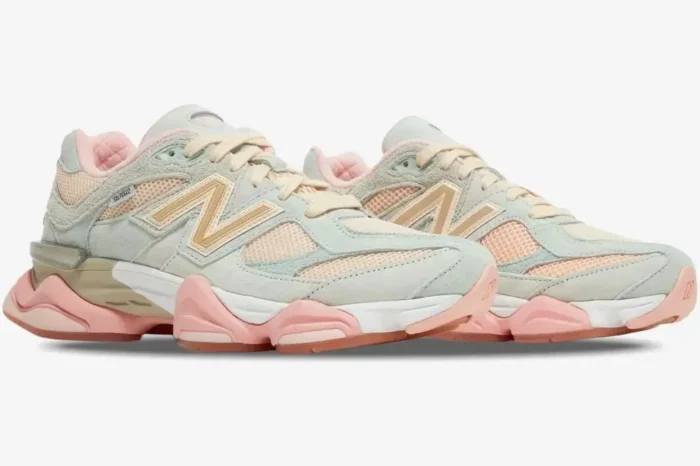 New Balance 9060 x Joe Freshgoods Inside Voices Penny Cookie Pink sneakers in a three-quarter side view. - SKU U9060JG1