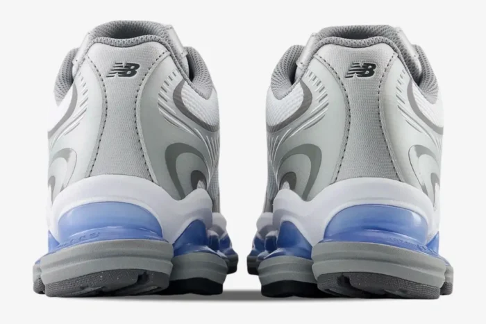 Rear view of New Balance Abzorb 2000 grey sneakers with blue translucent sole cushioning. - SKU U2000AA