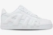 Side profile of a white Nike Air Force 1 Low x Cactus Plant Flea Market sneaker with large AIR lettering. - SKU FQ7069100