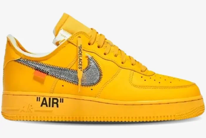 Side profile of Nike Air Force 1 Low x Off-White University Gold Lemonade sneakers in bright yellow. - SKU DD1876-700