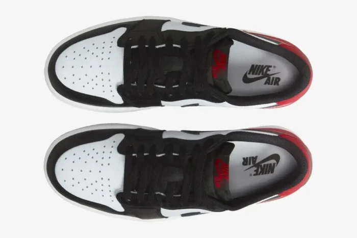 Top-down view of Air Jordan 1 Low Black Toe sneakers with white, black, and red details. - SKU 553558-116