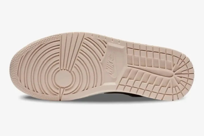 Bottom view of the Air Jordan 1 Low Black Guava Ice women's sneaker showing the pale pink outsole pattern. - SKU DC0774-003
