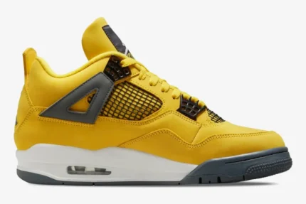 Side profile of yellow Air Jordan 4 Retro Lightning sneakers with grey accents and white midsole. - SKU CT8527-700