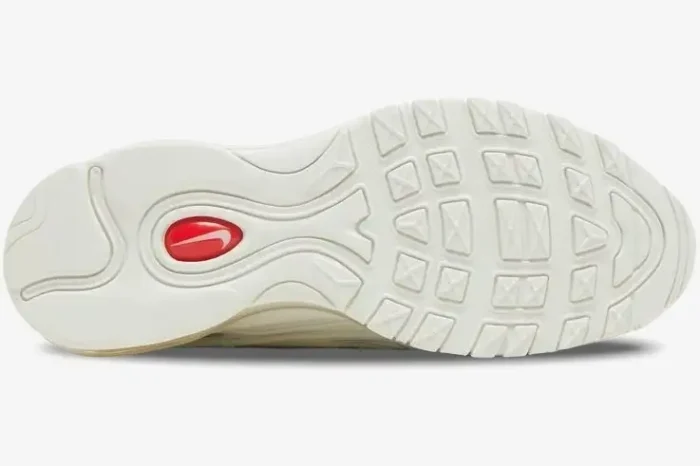 Bottom outsole view of the Nike Air Max 98 TL x Supreme White sneaker featuring a red swoosh logo. - SKU DR1033-100