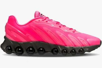 Side profile of Nike Air Max Dn8 sneakers in Hyper Pink with a black chunky sole and visible air units. - SKU FQ7860-600