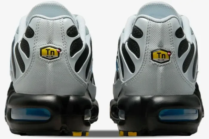 Rear view of Nike Air Max Plus Grey University Blue sneakers featuring the Tn Air heel logo. - SKU DM0032-015